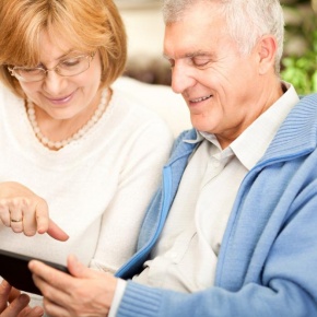 senior-couple-using-tablet senior-couple-using-tablet