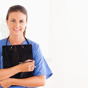 smiling-nurse-holding-a-folder smiling-nurse-holding-a-folder